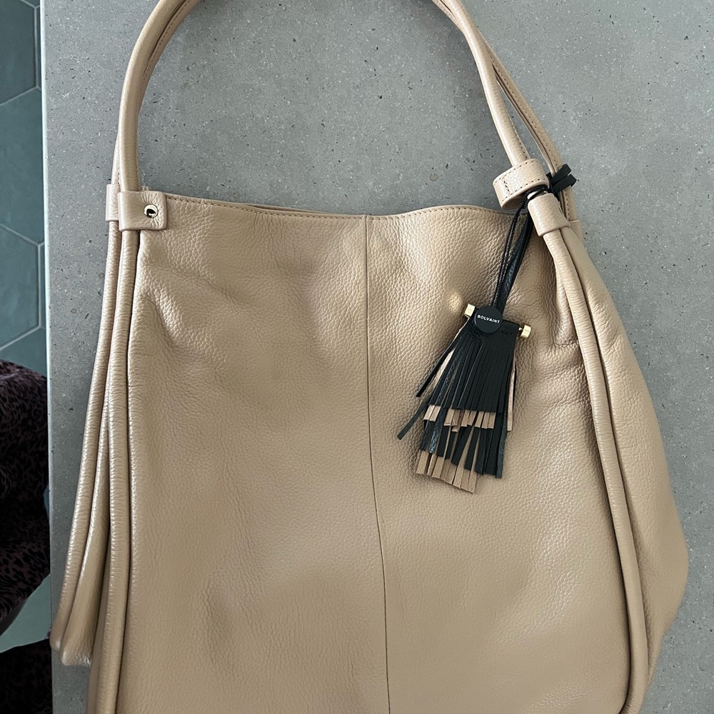 Tan Leather Shoulder Bag with Tassel and Slouchy Design